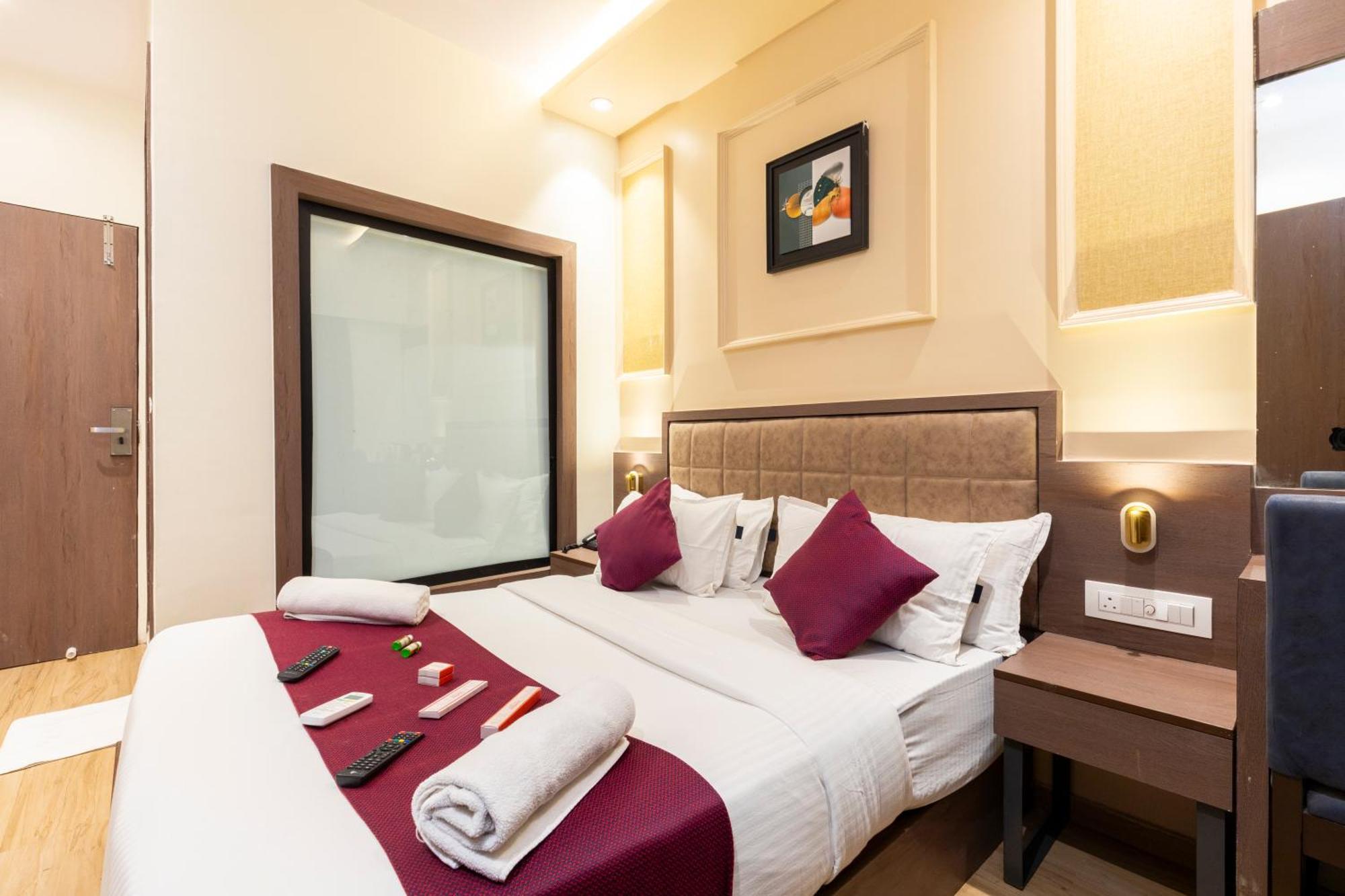 Horizon Inn Near Exhibition Center Мумбаї Номер фото